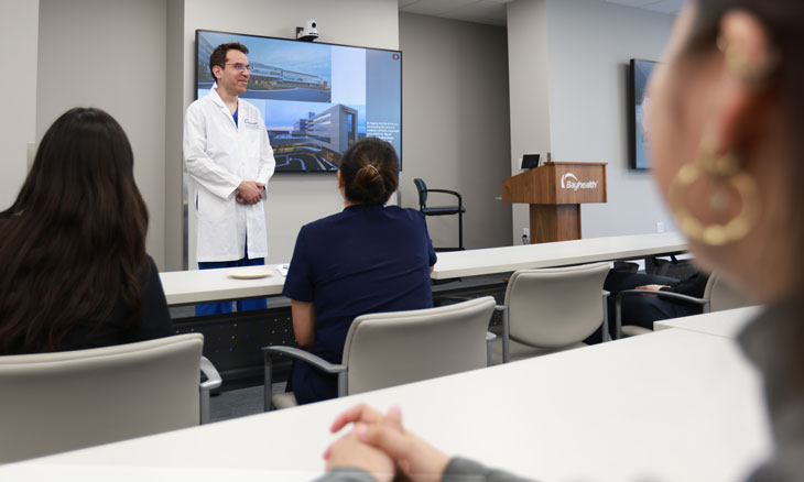 Faculty member teaching general surgery residents at Bayhealth.