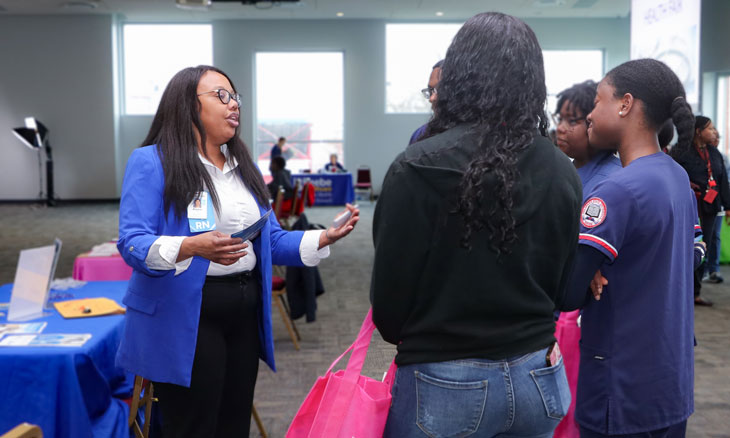 Alana King talking with DSU Students