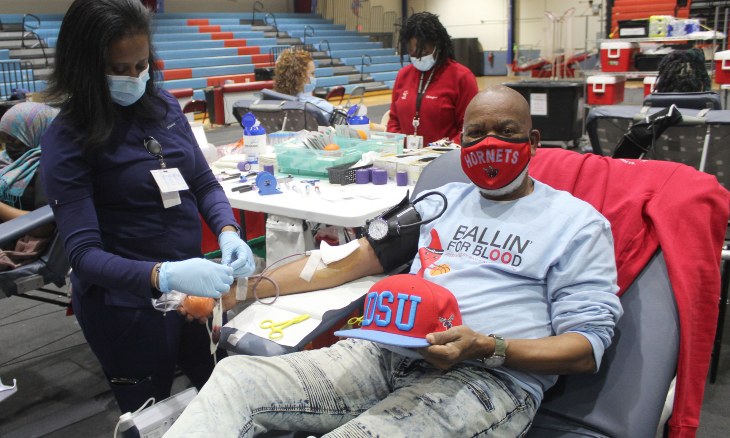 A man donates blood.